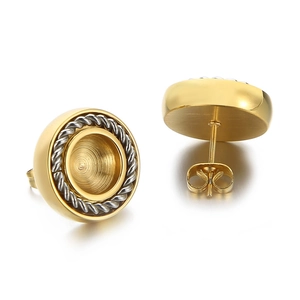 Macro view of gold and silver stainless steel round stud earrings with twisted rope pattern