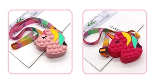 Detail view of pink unicorn silicone pop fidget shoulder bags with rainbow straps