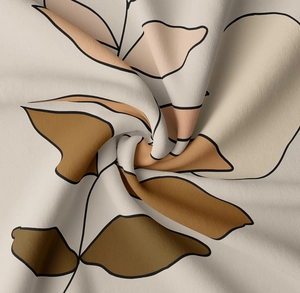 Gros plan sur un tissu imprimé de feuilles abstraites, texture douce et style moderne
