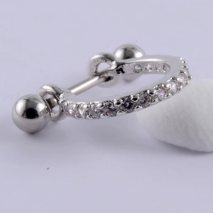 Detailed view of silver stainless steel cartilage stud with clear cubic zirconia insets
