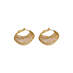 Minimalist gold irregular mesh hollow earrings with textured weave pattern on white background