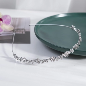 Elegant floral silver bridal headband with sparkling rhinestones for wedding occasions