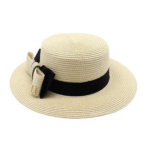Classic white boater straw hat with black ribbon and M-letter bow for sun protection
