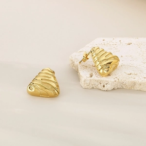 Vintage gold irregular triangle stud earrings with embossed texture on mineral stone