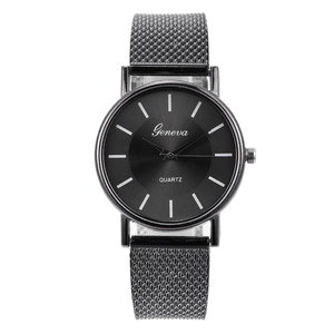 Detailed close-up of Geneva minimalist quartz watch with black mesh band and dial