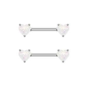 Macro view of heart-shaped white opal nipple rings with polished silver barbells