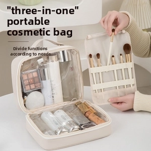 Detailed interior of a beige PU leather makeup bag with multiple storage compartments