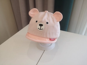 Detailed view of pink striped baby sun hat featuring 3D bear ears and cute embroidery
