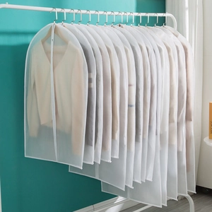 Translucent garment dust covers on a white clothing rack for organized home storage