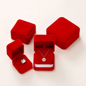Detailed top view of premium red velvet jewelry box set for rings and necklaces