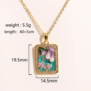 Detailed view of enamel flower pendant with freshwater pearl and dimensions on gold chain