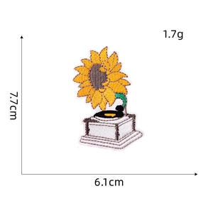 Macro detail of sunflower phonograph embroidery patch with dimensions 7.7cm x 6.1cm