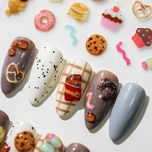 3D embossed dessert nail art stickers with cookies and cupcakes for professional manicures