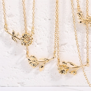 Multiple layered 18K gold plated necklaces featuring 3D floral birth flower pendants