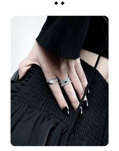 Close-up of S925 sterling silver open rings with irregular texture and vintage punk style