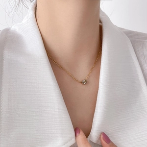 18K gold plated titanium steel necklace with an oval cubic zirconia pendant for women
