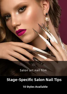 Artistic salon nail tips in ten sizes featuring pearls and glitter on ultra-long shapes
