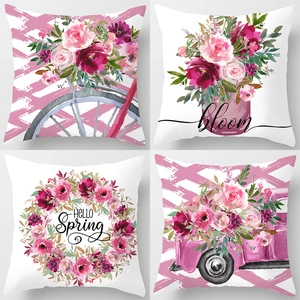 Set of four floral peach skin pillow covers featuring spring bloom watercolor designs