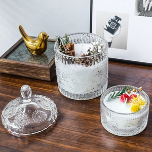 Nordic glass aromatherapy candle jar with sunflower relief and botanical dry flower design