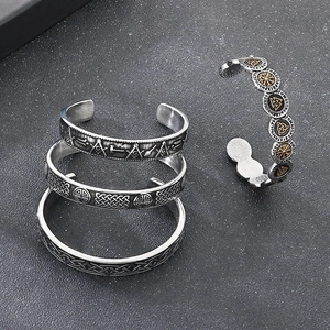 Vintage Viking runes and compass engravings on four silver adjustable stainless steel bracelets
