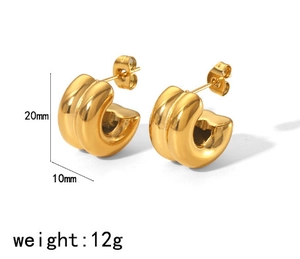 Detailed view of chunky 18K gold C-shaped earrings with 20mm height and 10mm width measurements