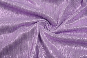 Close-up of metallic purple fabric with fine vertical textures and silver shimmering luster