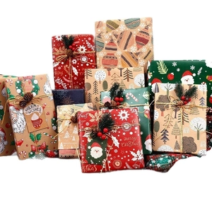 Vintage Christmas kraft wrapping paper set with festive patterns of reindeer and Santa Claus