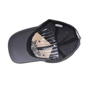 Close-up of 100% cotton washed baseball cap interior with wash label and shape support