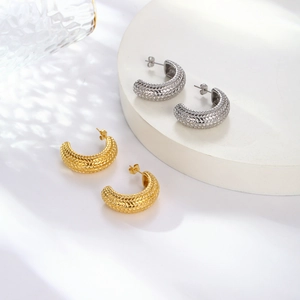 Retro C-shaped stainless steel hoop earrings with woven texture in gold and silver