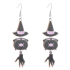 Detail of Halloween wooden earrings with wizard hat, cauldron, and skull claw design