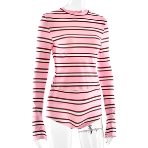 Close-up of pink striped two-piece set featuring long-sleeve top and high-waist shorts
