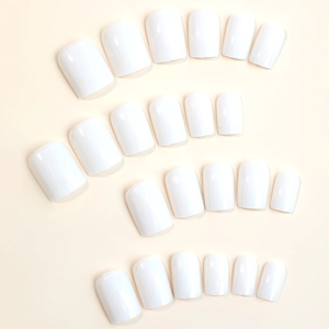 Short minimalist creamy white glossy press-on nails set in square-oval shape for women