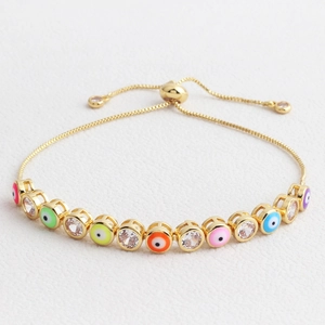 Macro view of adjustable evil eye bracelet featuring colorful beads and clear zircons