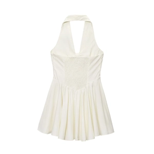 White halter neck backless dress with ruched elastic back and pleated A-line skirt detail