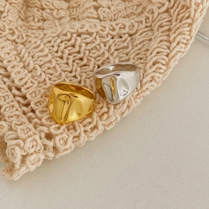 Minimalist irregular ruffled stainless steel rings in gold and silver finishes