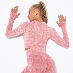 Pink marble seamless yoga set featuring long sleeve crop top and high waist leggings