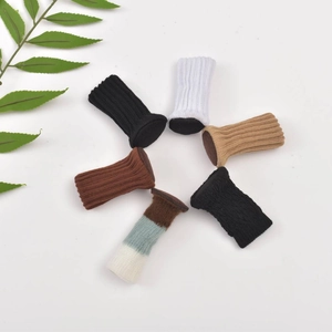 Knitted chair leg covers in various colors for floor protection and noise reduction