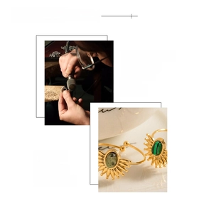 Detail of 18K gold plated ring featuring a sunburst design with green malachite stone