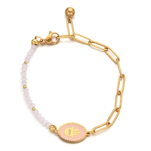 Detail of Hamsa Hand charm on mixed gold clip and pink beaded stainless steel bracelet