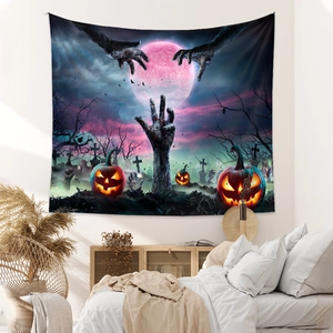Detail of Halloween tapestry with zombie hand and glowing pumpkins in bedroom setting