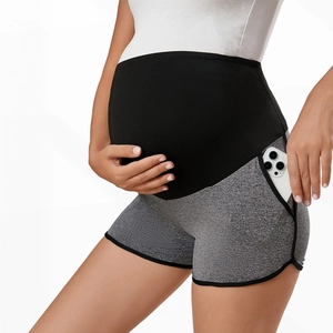 High-waisted maternity athletic shorts with grey patchwork and side phone pocket