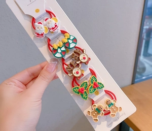 Détail de 10 élastiques à cheveux de Noël avec Père Noël, renne et bonhomme de pain d'épices