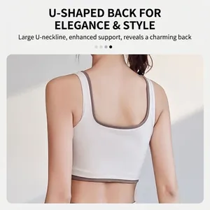 White high-elastic sports bra with brown contrast piping and deep U-shaped back design
