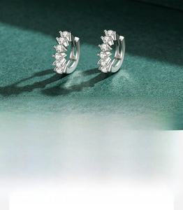 Macro shot of 925 sterling silver hoop earrings with hand-set 5A cubic zirconia stones