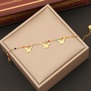 Bracelet papillon en acier inoxydable doré avec perles colorées sur coffret cadeau