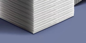 Macro detail of stacked transparent sticky note sheets showing thickness and smooth edges