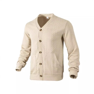 Detail of V-neck men's knit cardigan with cable knit texture and textured buttons
