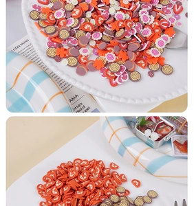 Macro detail of mixed colorful fruit polymer clay slices for DIY crafts in a white plate