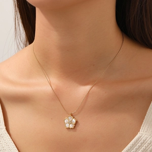 Gold-plated stainless steel necklace featuring a white shell flower pendant with zircon