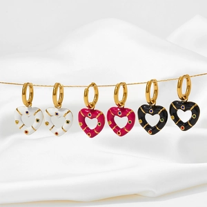 Chic gold-plated heart-shaped hoop earrings with colorful zircon inlays on white silk